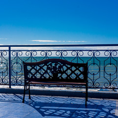 bench in front of the sea. holiday travel concept