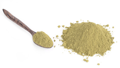 powdered green tea with bamboo spoon , isolated on white backgro