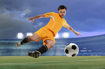 Obraz premium Soccer Player Kicking Ball