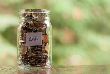 Jar of full coins in concept money saving