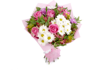 Bright buketny composition from fresh flowers, the white isolated background