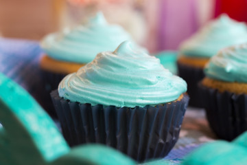 Vanilla cupcakes with mint cream