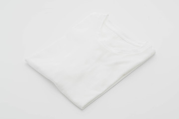 Fototapeta na wymiar shirt. folded t-shirt on white