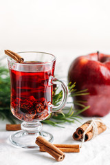 Food background of ingredients for winter drink or tea with cinnamon, raisins and apple Christmas New year postcard