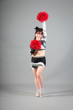 Studio Shot of Cheerleader Posing