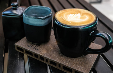 A coffee of cup on the wood table