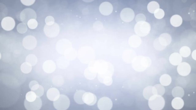Abstract blue bokeh background. Moving lights particles. Computer generated seamless loop.