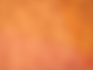 Blurry grungy abstract yellow and gold background. Blurred surface