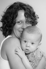 Happy mum with her baby boy