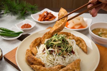 mandu twigim Fried Dumplings with Vegetables in Spicy Sauce
