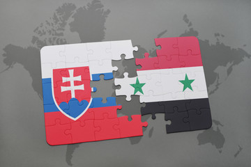puzzle with the national flag of slovakia and syria on a world map