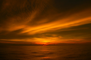 Fototapeta na wymiar Scenic view of beautiful sunset above the sea. Beautiful cloud texture.