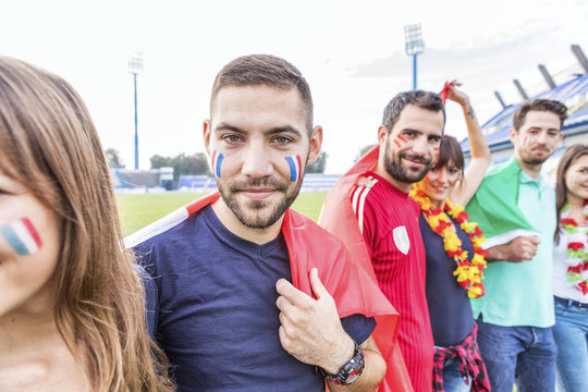 Group of soccer fans on soccer field