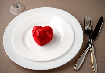 Romantic gift on white plate for Valentines day.