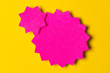 Blank promotional signs on a bright yellow background.