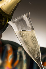 Glass with champagne isolated on background