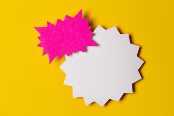 Blank promotional signs on a bright yellow background.