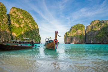 A long tail boat sits in Maya Bay, Krabi, Thailand