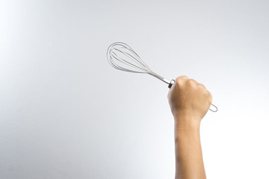 Hand Holding Stainless Balloon Whisk