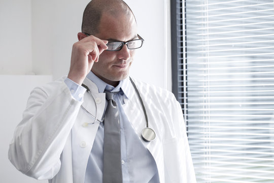 Portrait of doctor with eyeglasses and stethoscope