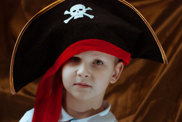 a young pirate in a black hat, pirate logo,