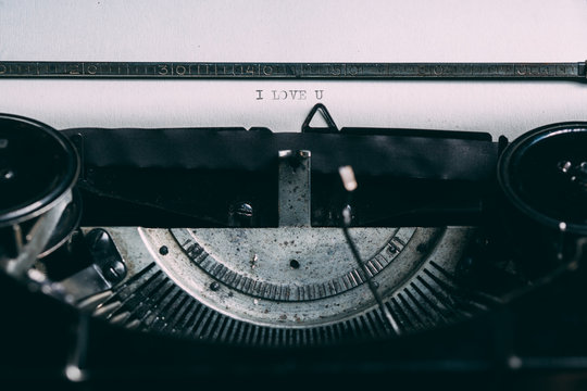 Close up of a retro typewriter with love message