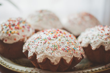 fresh Easter cakes on a baking sheet  the table