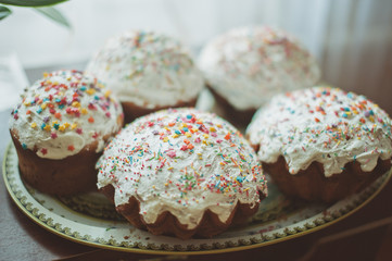 fresh Easter cakes on a baking sheet  the table