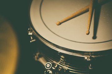 Snare drum and a pair of drum sticks