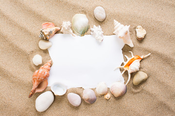 Message in torn paper on the beach. Summer background with hot s