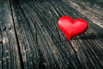 Red heart on wooden background. Valentines day. Copy space