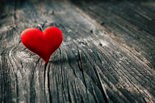 Red heart on wooden background. Valentines day. Copy space
