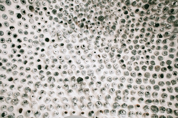 Texture background with ceramic or stone little holes 