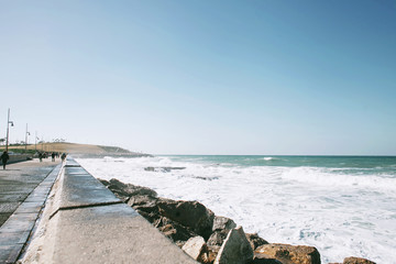 Seascape and waves on a sunny day