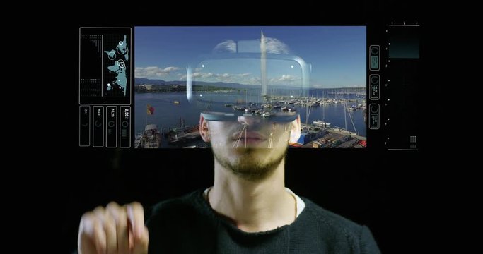 A boy uses the oculus and augmented reality interface traveling in 3D graphics. A virtual trip but real, innovative technology, Concept: technology, oculus, augmented reality and hologram.
