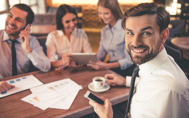 Business people in cafe