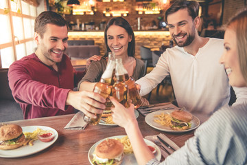 Friends resting in cafe