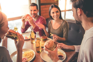 Friends resting in cafe