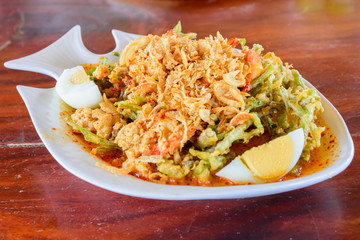 Thai food spicy crispy deep fried morning glory with shrimp