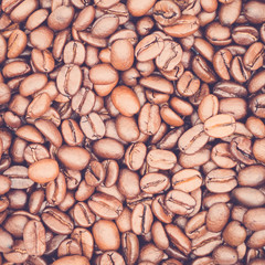 Vintage toned coffee beans for texture or background, top view
