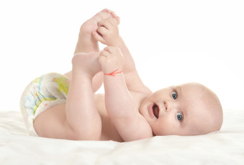 Adorable baby boy  in pampers