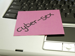 Memo note on notebook, cyber-sex