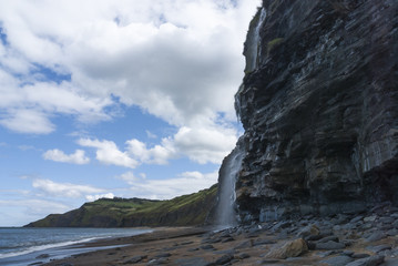 Fototapeta na wymiar A new waterfall after heavy rain on the east coast of England