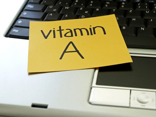 Memo note on notebook, vitamin A