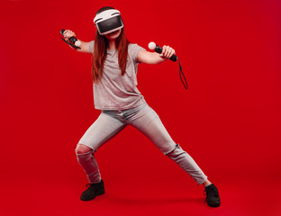 Smile happy woman getting experience using VR-headset glasses of virtual reality