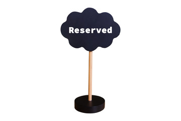 reserved sign on blackboard with stand on white background