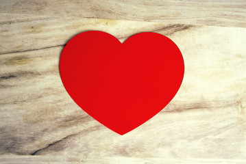 red heart wth table wood