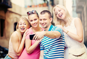 Fototapeta premium young people taking selfie outdoors .
