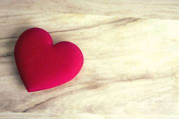 heart red on wooden table