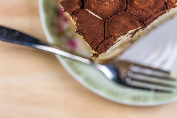 Sliced Cake On Dish With Fork
